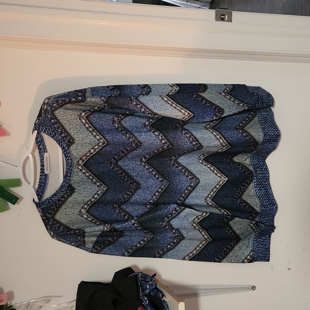 Miss look Denim like sweater. Never worn.